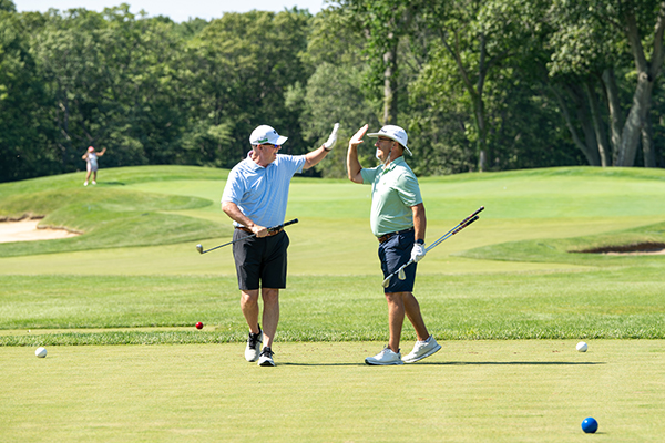 High fives on the golf course