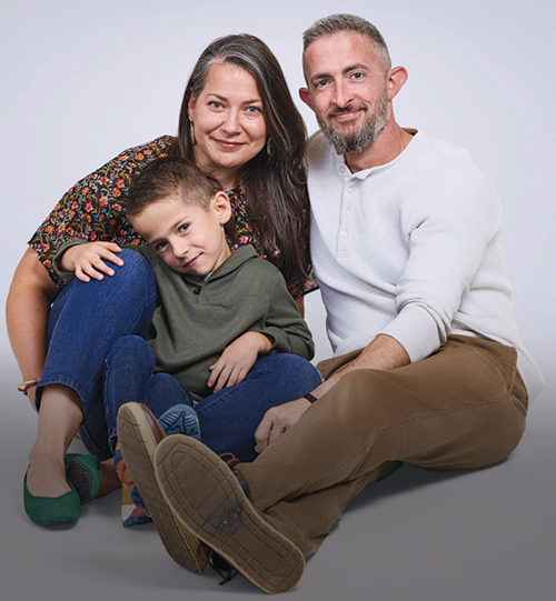 Jasper with his parents Lenka and Craig