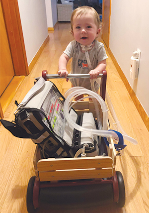 Jasper pushing his trach machine