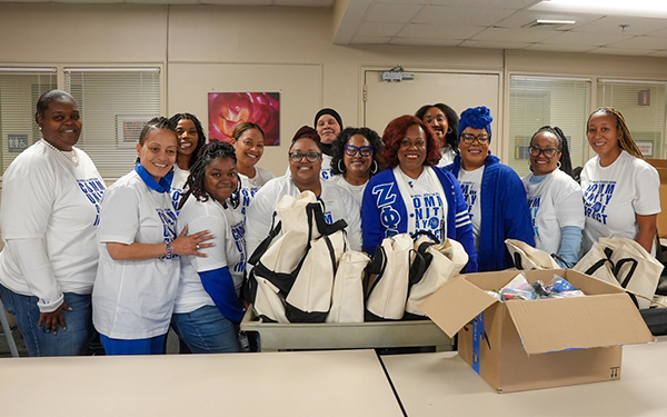 Group of sorority friends visit hospital staff to make donation