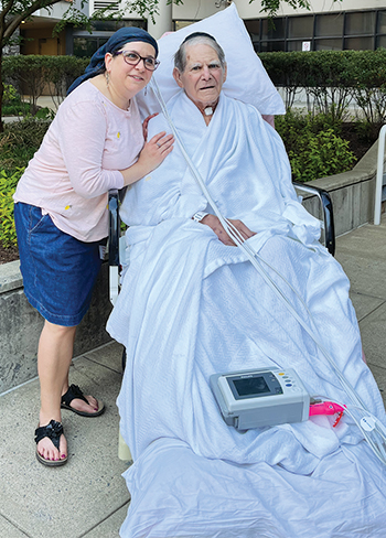 Allan Shapiro outside of hospital with family member