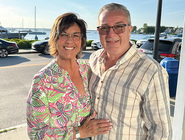 Sharon and Joe Kilday pose near waterfront