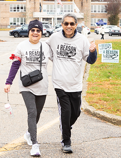 two participants walking on course for A Reason to Run